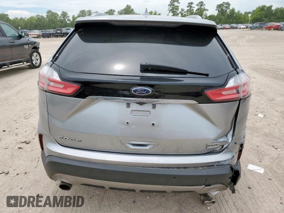 2020 Ford Edge SEL with VIN 2FMPK3J90LBA71592, listed as a Copart auction lot 62362655 with 100,040 mi miles and Salvage title. Bid and sale history available at DreamBid. Image 6.