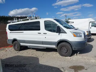 2017 Ford Transit XL with VIN 1FBZX2YM2HKB05049, listed as a IAAI auction lot 41966567 with Not Provided miles and . Bid and sale history available at DreamBid. Image 13.