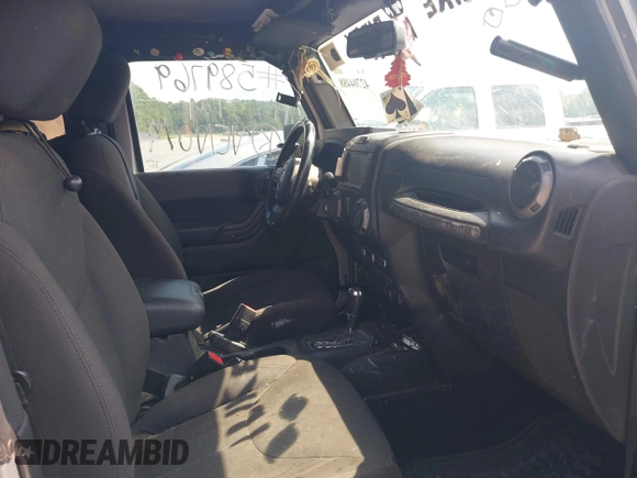 2015 Jeep Wrangler Freedom Edition with VIN 1C4AJWAG4FL589769, listed as a IAAI auction lot 42704488 with 194,414 mi miles and . Bid and sale history available at DreamBid. Image 5.