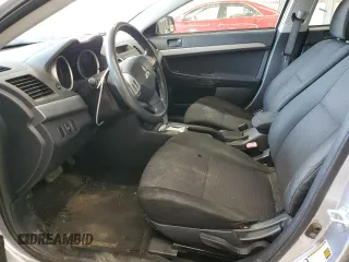 2010 Mitsubishi Lancer ES with VIN JA32U2FU1AU032595, listed as a Copart auction lot 63184444 with 145,705 mi miles and Salvage Title. Bid and sale history available at DreamBid. Image 7.
