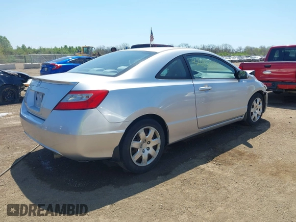 2010 Honda Civic Cpe LX with VIN 2HGFG1B67AH535385, listed as a IAAI auction lot 42085053 with 150,803 mi miles. Bid and sale history available at carsss.com. Image 4.