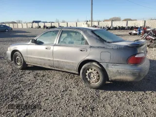 2000 Mazda 626 LX with VIN 1YVGF22D5Y5120152, listed as a Copart auction lot 44571595 with 177,624 mi miles and Salvage Title. Bid and sale history available at carsss.com. Image 2.
