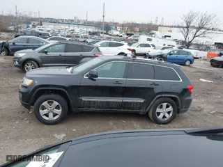 2011 Jeep Grand Cherokee Laredo with VIN 1J4RR4GGXBC511475, listed as a IAAI auction lot 41554620 with 164,361 mi miles. Bid and sale history available at carsss.com. Image 14.
