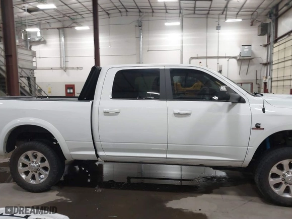 2018 Ram 2500 Laramie with VIN 3C6UR5FL1JG213467, listed as a IAAI auction lot 41513596 with 100,855 mi miles. Bid and sale history available at carsss.com. Image 14.