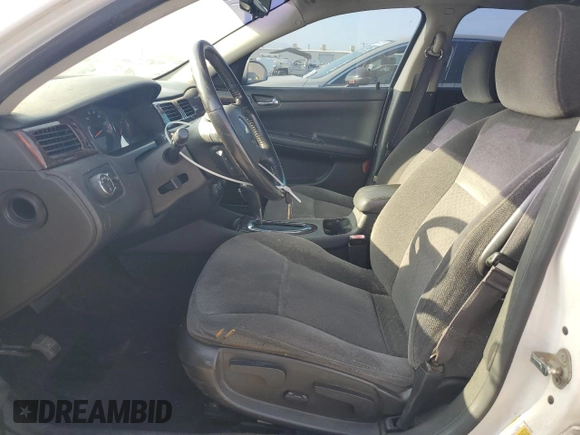 2014 Chevrolet Impala LT with VIN 2G1WB5E3XE1128402, listed as a Copart auction lot 63413525 with 101,161 mi miles and Salvage title. Bid and sale history available at DreamBid. Image 7.