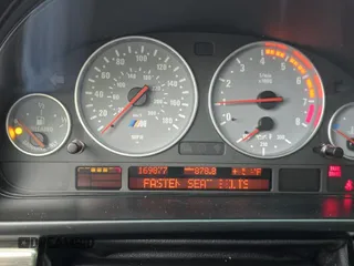2000 BMW M5 z VIN WBSDE9343YBZ94710, wystawiony jako Copart lot #56716935 z przebiegiem 169 877 mil mil oraz Tytuł czysty. Historia ofert i sprzedaży dostępna na DreamBid. Obrazek 8.