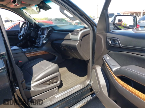 2015 Chevrolet Tahoe LTZ z VIN 1GNSKCKC7FR715512, wystawiony jako IAAI lot #42054583 z przebiegiem 106 941 mil mil oraz . Historia ofert i sprzedaży dostępna na DreamBid. Obrazek 5.