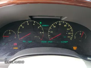 2004 Cadillac DeVille DTS z VIN 1G6KF579X4U203102, wystawiony jako Copart lot #50426955 z przebiegiem 157 290 mil mil oraz Szkody całkowita. Historia ofert i sprzedaży dostępna na DreamBid. Obrazek 9.