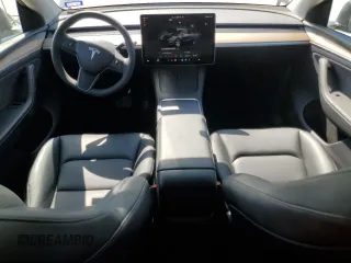 2024 Tesla Model Y Long Range with VIN 7SAYGDEE5RA282984, listed as a Copart auction lot 52388455 with 11,922 mi miles and Salvage Title. Bid and sale history available at DreamBid. Image 8.