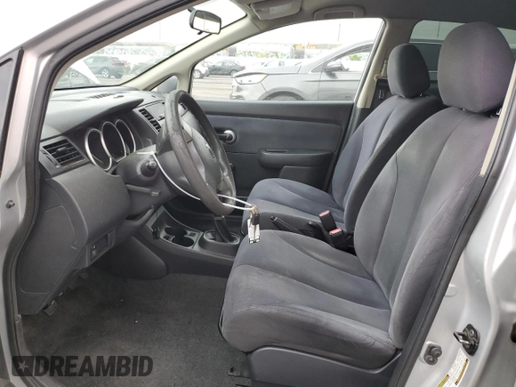 2009 Nissan Versa 1.6 with VIN 3N1CC11E79L429613, listed as a Copart auction lot 72220034 with 134,891 mi miles and Salvage Title. Bid and sale history available at carsss.com. Image 7.