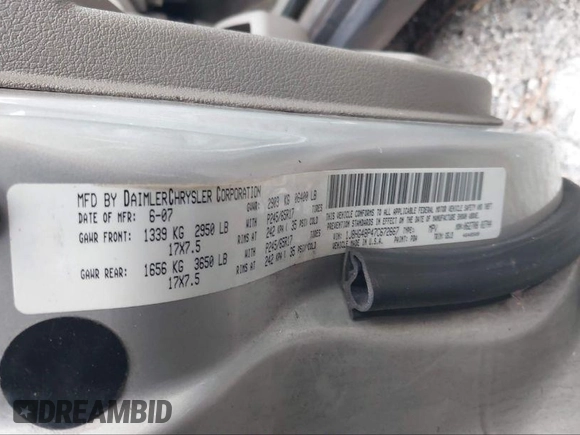 2007 Jeep Commander Sport z VIN 1J8HG48P47C672667, wystawiony jako IAAI lot #40423450 z przebiegiem 230 823 mil mil oraz . Historia ofert i sprzedaży dostępna na DreamBid. Obrazek 9.