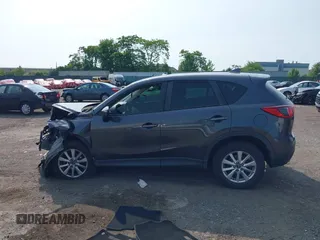 2016 Mazda CX-5 Sport with VIN JM3KE4BY7G0893984, listed as a IAAI auction lot 42479813 with Not provided miles and . Bid and sale history available at DreamBid. Image 15.