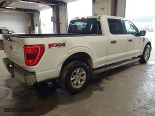 2021 Ford F-150 XL with VIN 1FTFW1E82MFB31401, listed as a IAAI auction lot 41974324 with 112,933 mi miles. Bid and sale history available at carsss.com. Image 4.