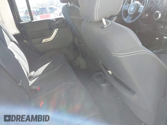 2013 Jeep Wrangler Unlimited Sahara with VIN 1C4BJWEG3DL617511, listed as a IAAI auction lot 41842979 with 149,980 mi miles and . Bid and sale history available at DreamBid. Image 8.