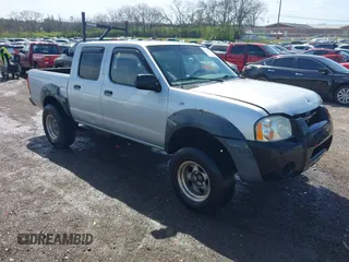 2001 Nissan Frontier SE z VIN 1N6ED27T11C371123, wystawiony jako IAAI lot #41874917 z przebiegiem 291 582 mil mil oraz . Historia ofert i sprzedaży dostępna na DreamBid. Obrazek 1.