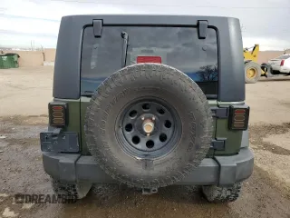 2007 Jeep Wrangler Unlimited X z VIN 1J4GA39197L181305, wystawiony jako Copart lot #45928555 z przebiegiem Nie podano mil oraz Szkoda całkowita • Salvage title. Historia ofert i sprzedaży dostępna na DreamBid. Obrazek 6.