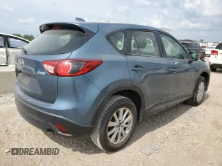 2015 Mazda CX-5 Sport z VIN JM3KE2BE8F0434116, wystawiony jako Copart lot #60712625 z przebiegiem 300 405 mil mil oraz Szkoda całkowita • Salvage title. Historia ofert i sprzedaży dostępna na DreamBid. Obrazek 3.