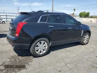 2015 Cadillac SRX Luxury Collection z VIN 3GYFNBE30FS527431, wystawiony jako Copart lot #52437015 z przebiegiem 110 395 mil mil oraz Czysty tytuł • Clean title. Historia ofert i sprzedaży dostępna na DreamBid. Obrazek 3.