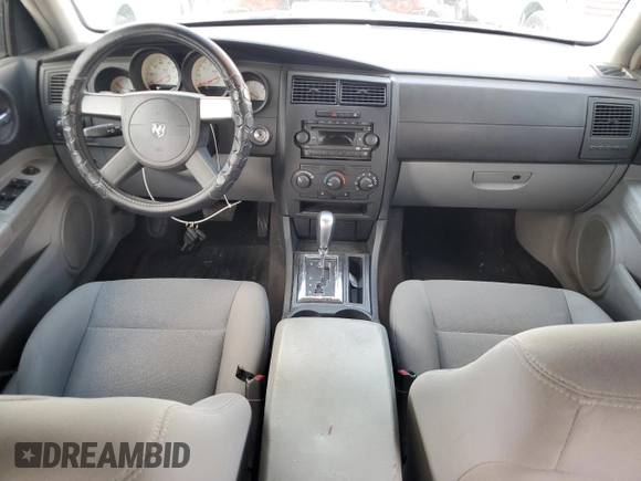 2006 Dodge Charger with VIN 2B3KA43G46H306680, listed as a Copart auction lot 54074305 with 102,912 mi miles and Salvage Title. Bid and sale history available at DreamBid. Image 8.