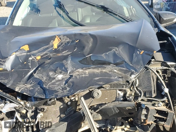 2019 Toyota Corolla L z VIN 2T1BURHE1KC198906, wystawiony jako Copart lot #87813125 z przebiegiem Nie podano mil oraz Nie do naprawy • Non repairable. Historia ofert i sprzedaży dostępna na DreamBid. Obrazek 11.