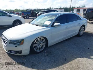 2014 Audi A8 4.0T with VIN WAUR2AFD8EN004371, listed as a IAAI auction lot 42693492 with 159,405 mi miles and . Bid and sale history available at DreamBid. Image 17.