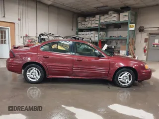 2002 Pontiac Grand Am SE z VIN 1G2NE52F92C291335, wystawiony jako IAAI lot #41665150 z przebiegiem 75 552 mil mil oraz . Historia ofert i sprzedaży dostępna na DreamBid. Obrazek 14.