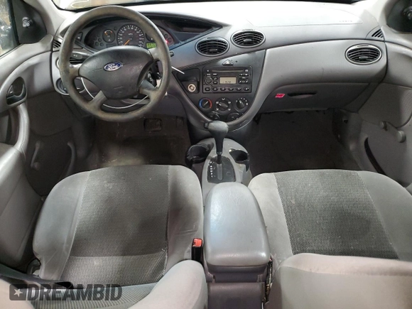 2003 Ford Focus LX z VIN 1FAFP33P03W313279, wystawiony jako Copart lot #89271495 z przebiegiem 152 672 mil mil oraz Szkoda całkowita • Salvage title. Historia ofert i sprzedaży dostępna na DreamBid. Obrazek 8.