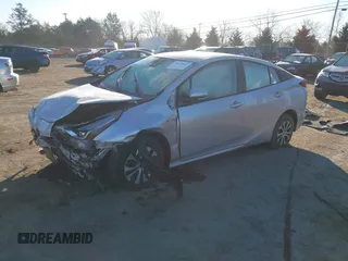 2020 Toyota Prius LE with VIN JTDL9RFU5L3013217, listed as a IAAI auction lot 41650064 with 124,704 mi miles and . Bid and sale history available at DreamBid. Image 18.