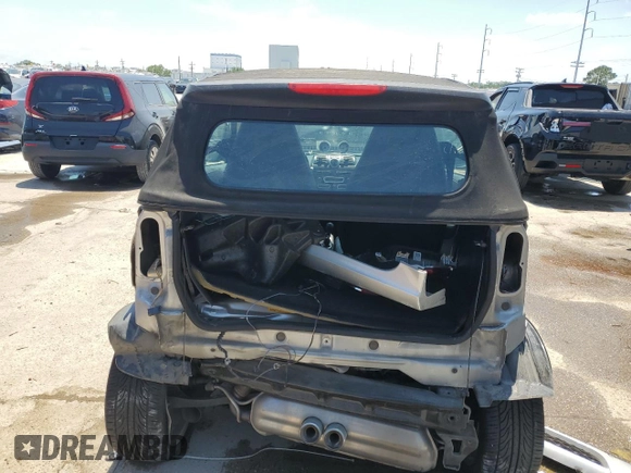 2009 Smart fortwo Passion z VIN WMEEK31X59K222243, wystawiony jako Copart lot #57106435 z przebiegiem 58 556 mil mil oraz Szkody całkowita. Historia ofert i sprzedaży dostępna na DreamBid. Obrazek 6.