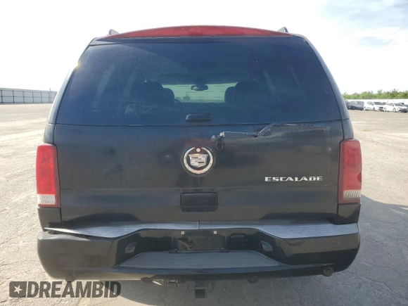 2003 Cadillac Escalade z VIN 1GYEK63N93R143629, wystawiony jako Copart lot #50333955 z przebiegiem 102 828 mil mil oraz Szkoda całkowita • Salvage title. Historia ofert i sprzedaży dostępna na DreamBid. Obrazek 6.