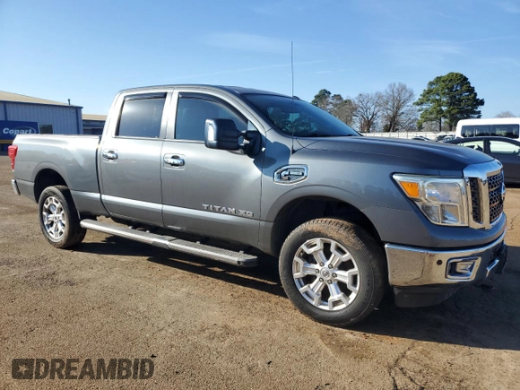 2016 Nissan Titan SL z VIN 1N6BA1F22GN503205, wystawiony jako Copart lot #47024925 z przebiegiem 90 936 mil mil oraz Czysty tytuł • Clean title. Historia ofert i sprzedaży dostępna na DreamBid. Obrazek 4.