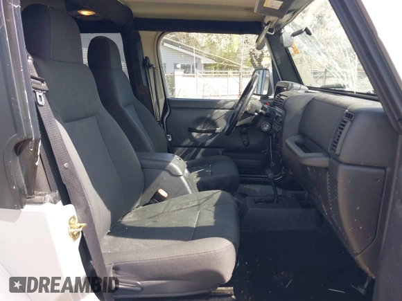 2006 Jeep Wrangler X with VIN 1J4FA39S16P787614, listed as a IAAI auction lot 41992315 with 61,788 mi miles. Bid and sale history available at carsss.com. Image 5.