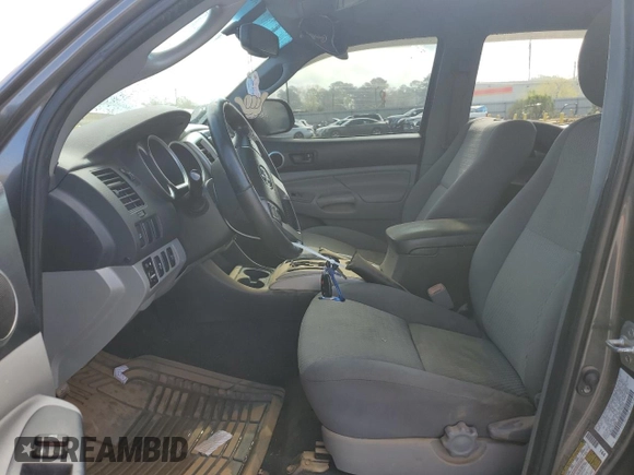 2013 Toyota Tacoma z VIN 3TMLU4EN0DM129808, wystawiony jako Copart lot #50353125 z przebiegiem 231 750 mil mil oraz Szkoda całkowita • Salvage title. Historia ofert i sprzedaży dostępna na DreamBid. Obrazek 7.