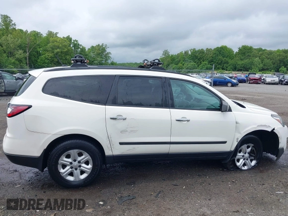 2015 Chevrolet Traverse LS z VIN 1GNKVFED4FJ197970, wystawiony jako IAAI lot #42020771 z przebiegiem 128 876 mil mil oraz . Historia ofert i sprzedaży dostępna na DreamBid. Obrazek 13.