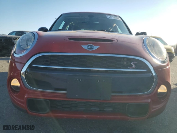 2016 MINI Cooper Hardtop 4 Door S with VIN WMWXU3C54G2B67486, listed as a Copart auction lot 74254944 with 71,031 mi miles and Salvage Title. Bid and sale history available at carsss.com. Image 5.