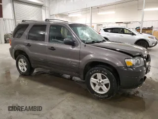 2005 Ford Escape Hybrid with VIN 1FMYU96H95KD66183, listed as a Copart auction lot 76875164 with 175,230 mi miles and Salvage title. Bid and sale history available at DreamBid. Image 4.