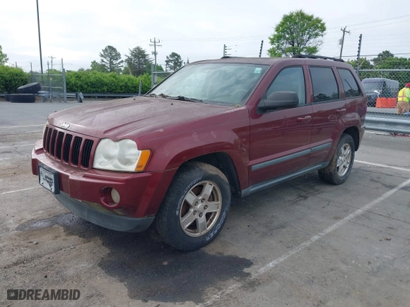 2007 Jeep Grand Cherokee Laredo with VIN 1J8GR48K27C535382, listed as a IAAI auction lot 42013097 with 180,554 mi miles. Bid and sale history available at carsss.com. Image 2.