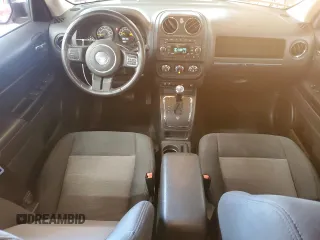 2014 Jeep Patriot Latitude with VIN 1C4NJRFB2ED734624, listed as a Copart auction lot 60675175 with 91,624 mi miles and Salvage title. Bid and sale history available at DreamBid. Image 8.