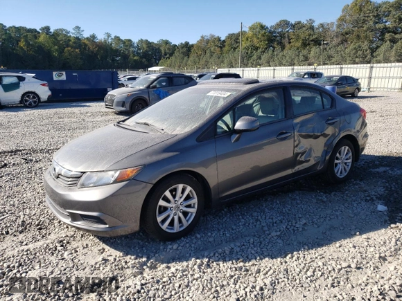 2012 Honda Civic EX-L with VIN 19XFB2F94CE048523, listed as a Copart auction lot 77019404 with 210,391 mi miles and Salvage Title. Bid and sale history available at DreamBid. Image 1.