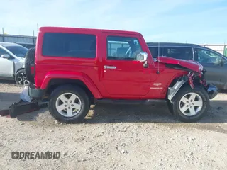 2011 Jeep Wrangler Sahara with VIN 1J4AA5D18BL561687, listed as a IAAI auction lot 41435436 with 76,284 mi miles and . Bid and sale history available at DreamBid. Image 14.