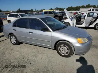 2001 Honda Civic LX z VIN 2HGES16521H511166, wystawiony jako Copart lot #61850595 z przebiegiem 153 192 mil mil oraz Szkoda całkowita • Salvage title. Historia ofert i sprzedaży dostępna na DreamBid. Obrazek 4.
