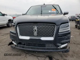 2021 Lincoln Navigator Black Label z VIN 5LMJJ3TT1MEL03959, wystawiony jako Copart lot #43876275 z przebiegiem Nie podano mil oraz Szkoda całkowita • Salvage title. Historia ofert i sprzedaży dostępna na DreamBid. Obrazek 5.