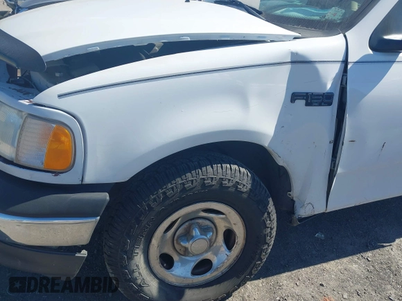 2002 Ford F-150 XL with VIN 1FTRF172X2NC07830, listed as a IAAI auction lot 41584706 with 143,255 mi miles. Bid and sale history available at carsss.com. Image 13.