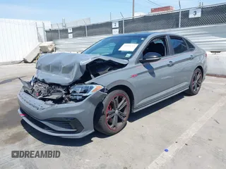 2019 Volkswagen Jetta GLI S z VIN 3VW6T7BU9KM153175, wystawiony jako IAAI lot #42099719 z przebiegiem 90 608 mil mil oraz . Historia ofert i sprzedaży dostępna na DreamBid. Obrazek 17.
