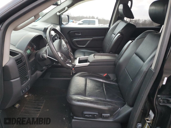 2015 Nissan Titan Pro-4X with VIN 1N6AA0EC2FN501632, listed as a Copart auction lot 84063524 with 92,342 mi miles and Salvage title. Bid and sale history available at DreamBid. Image 7.
