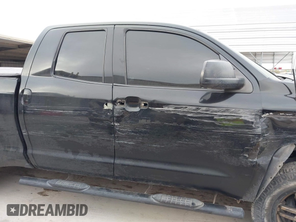 2014 Toyota Tundra 4WD Truck SR with VIN 5TFUM5F14EX051843, listed as a IAAI auction lot 41773983 with 145,089 mi miles. Bid and sale history available at carsss.com. Image 13.