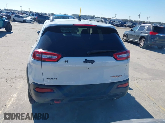 2018 Jeep Cherokee Trailhawk z VIN 1C4PJMBX8JD562994, wystawiony jako IAAI lot #41281555 z przebiegiem 86 702 mil mil oraz . Historia ofert i sprzedaży dostępna na DreamBid. Obrazek 17.