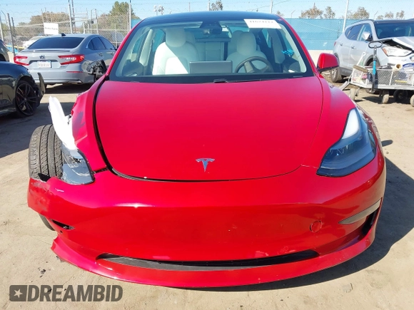 2021 Tesla Model 3 Long Range with VIN 5YJ3E1EBXMF990242, listed as a IAAI auction lot 41674222 with 24,554 mi miles and . Bid and sale history available at DreamBid. Image 12.