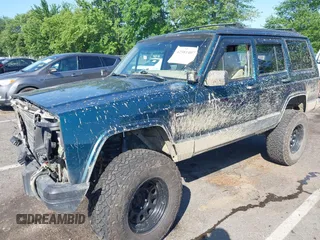 1995 Jeep Cherokee Sport z VIN 1J4FJ68S7SL623451, wystawiony jako IAAI lot #42581407 z przebiegiem 160 581 mil mil oraz . Historia ofert i sprzedaży dostępna na DreamBid. Obrazek 17.