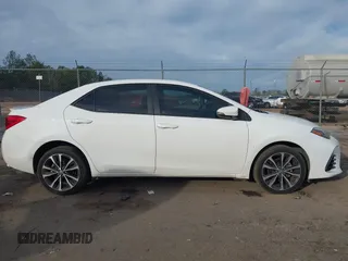 2017 Toyota Corolla L z VIN 5YFBURHE6HP632388, wystawiony jako IAAI lot #41299135 z przebiegiem 84 130 mil mil oraz . Historia ofert i sprzedaży dostępna na DreamBid. Obrazek 13.